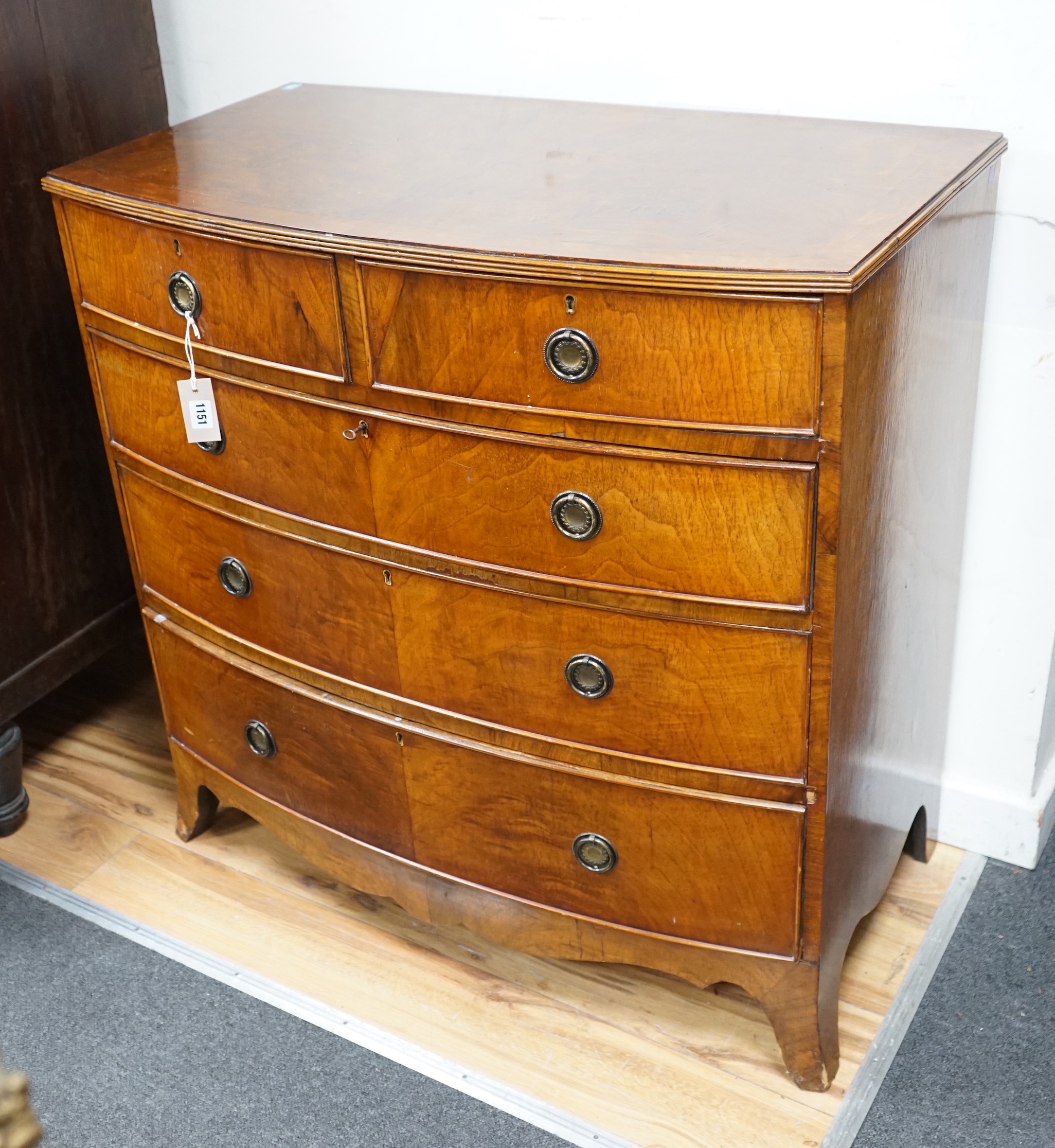 A Regency mahogany bowfront chest of two short and three long drawers, width 91cm, depth 50cm, height 92cm